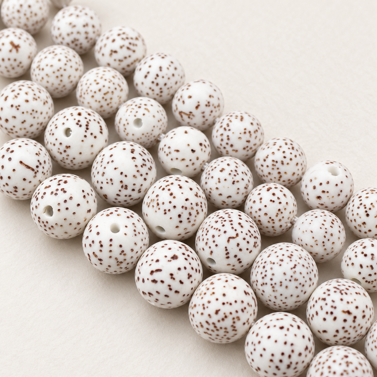 L-Moon and Star Bodhi seed beads — original studio product photograph